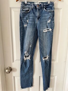 Blue Distressed Women’s Jeans bridge by gly 25